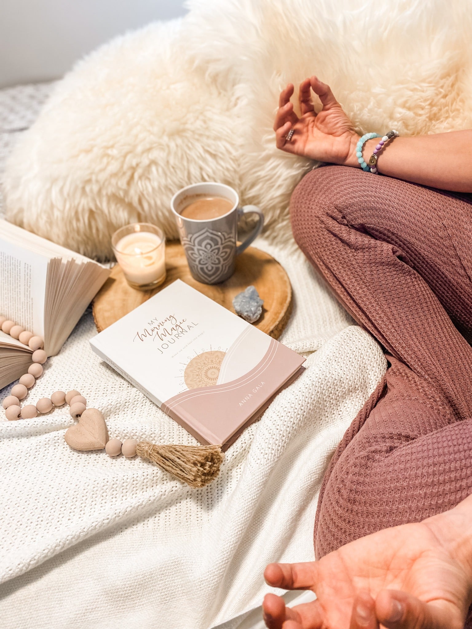 My Morning Magic Journal by Anna Gala, styled with a candle, mug and crystal